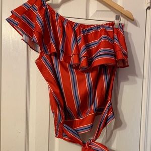 These three boutique one shoulder tie front top